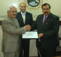 Mr. Ejaz Rasul Chawdhry, GM NPO Awarding Founding Member Certificate to Mr. Shaukat Masud, President ICCI